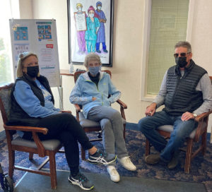 Family_members_visit_with_a_CHCC_resident_indoors_1200