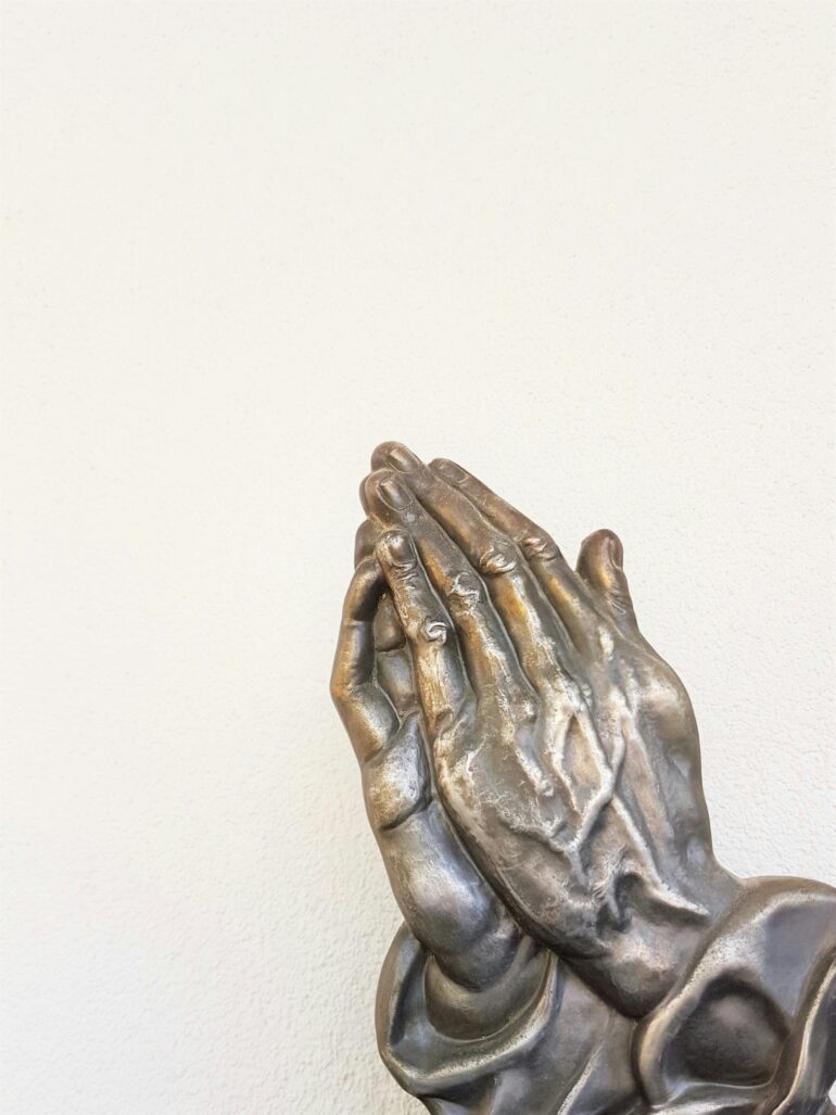 Praying hands.