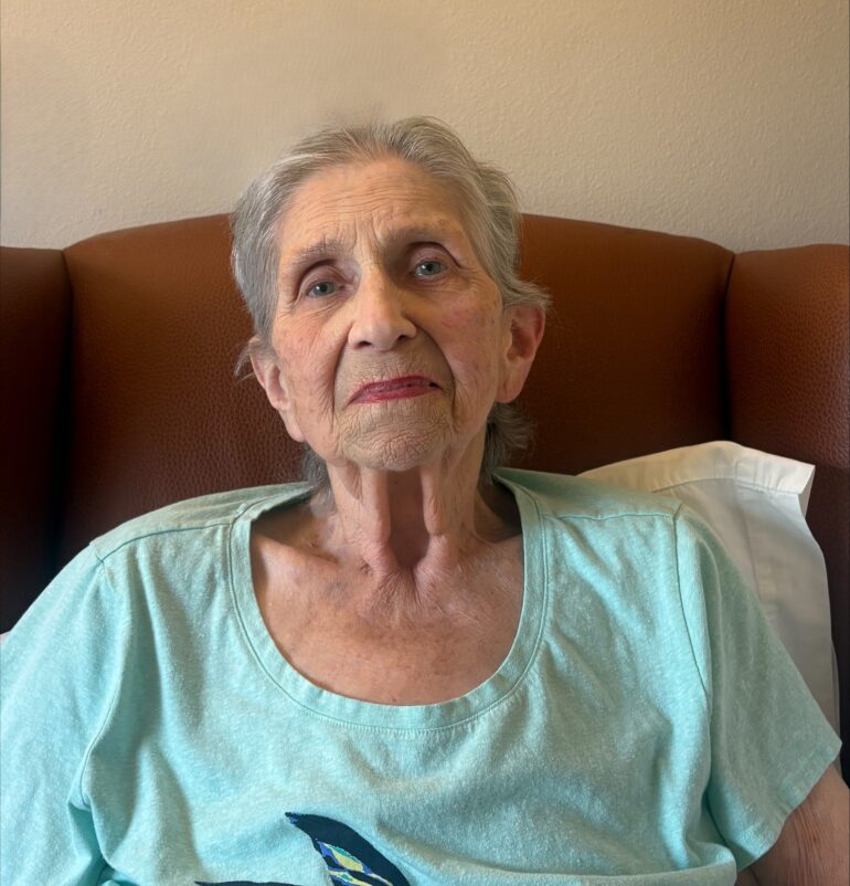 A CHCC resident named Betty sitting in a chair.