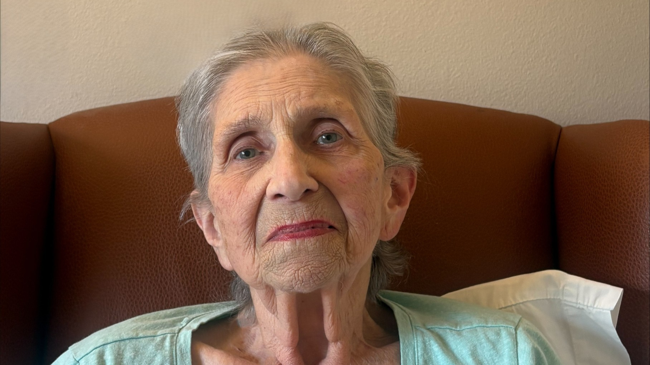 A CHCC resident named Betty sitting in a chair.