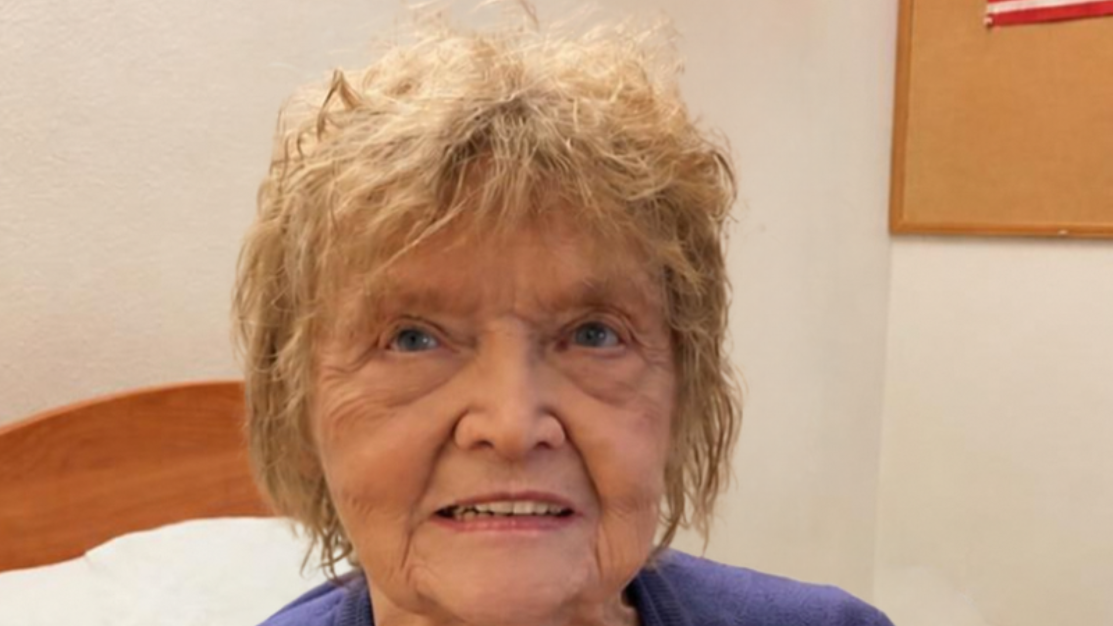 resident spotlight winner Margy sitting in her room